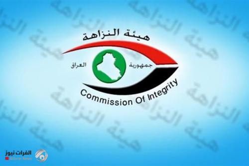 النزاهة تضبط 12 متهماً بحيازة وإنجاز معاملات خلافاً للقانون بذي قار